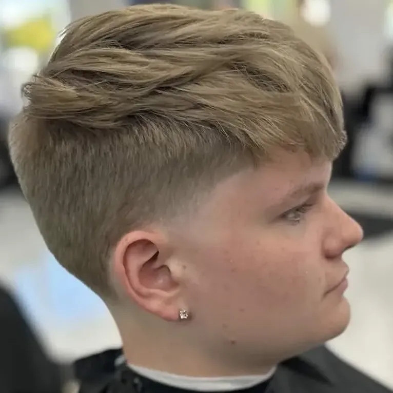 Side part haircut with hard part line, Cape Coral
